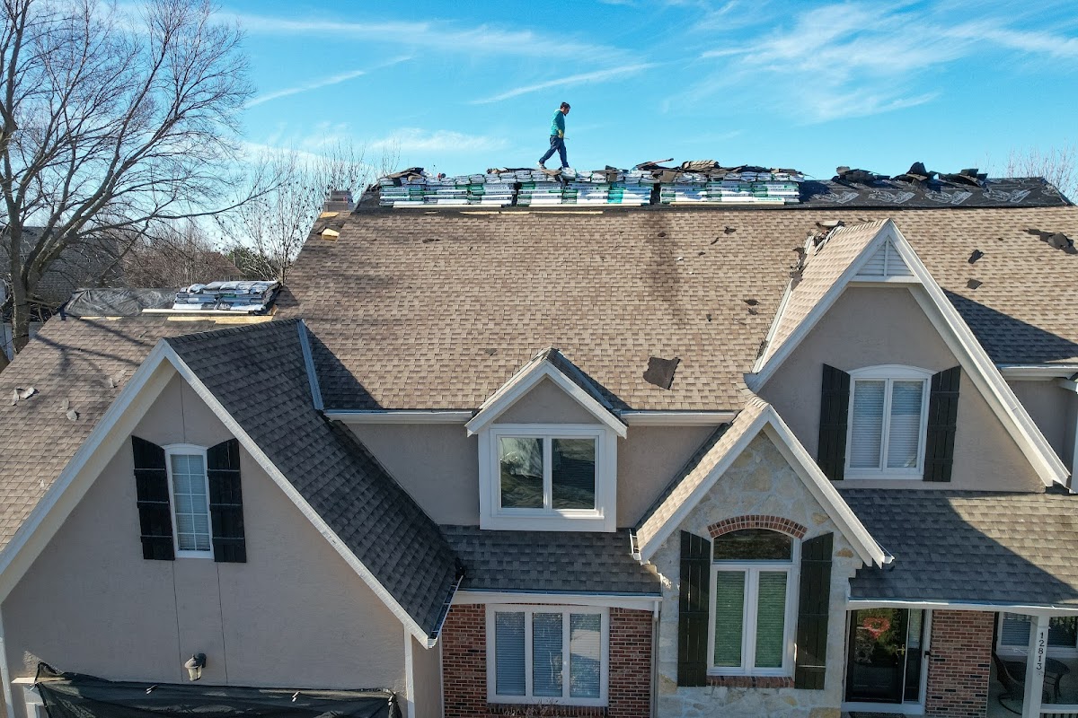 HT Roofing & Construction